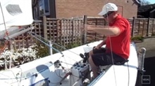 Sail control alongside a pontoon