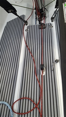 Front cockpit floor on GBR4078 at the 2020 Dinghy Show. Note spinnaker halyard is operated by the crew. Also fancy non-slip!